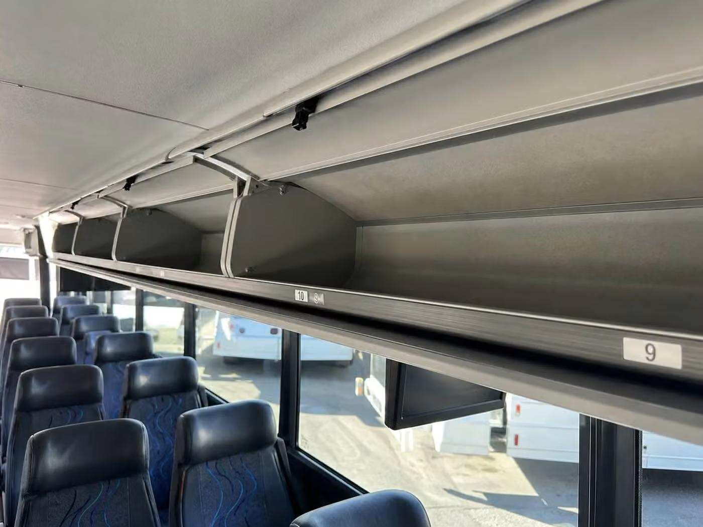 cedar rapids 25 passenger minibus overhead storage