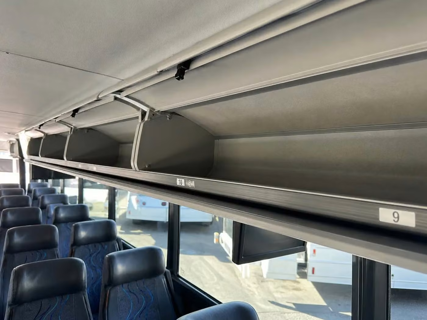cedar rapids charter bus overhead storage